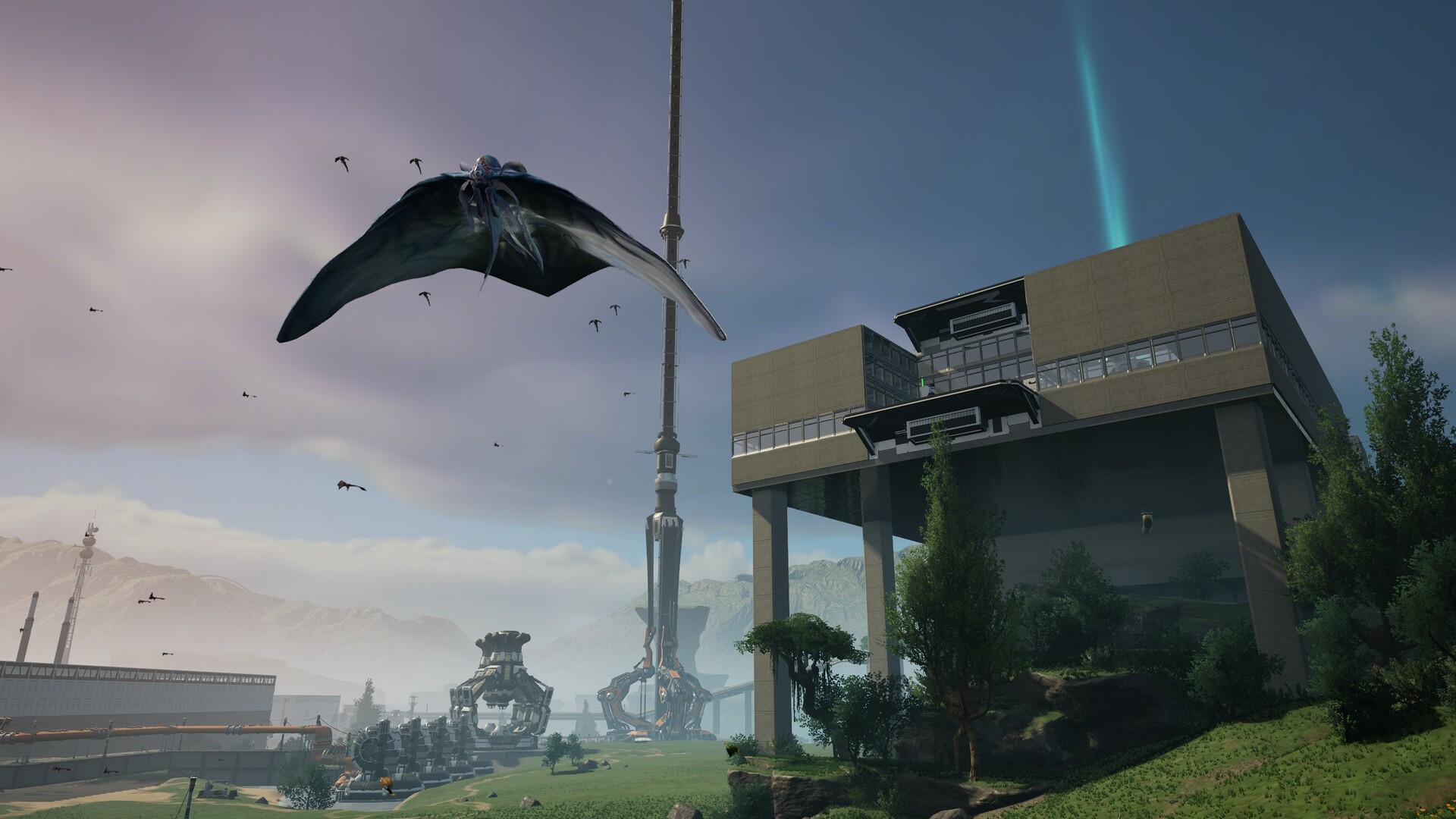 Satisfactory screenshot: A player-constructed building in the foreground, with a flying manta ray-like creature above it, and a space elevator and more factory in the background.