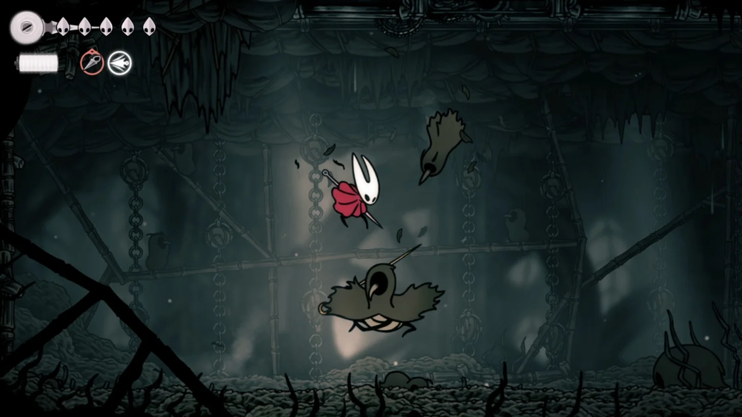 Silksong screenshot- Hornet, a bug with a horned mask and a red cloak, fights several Craws, bird-like enemies.